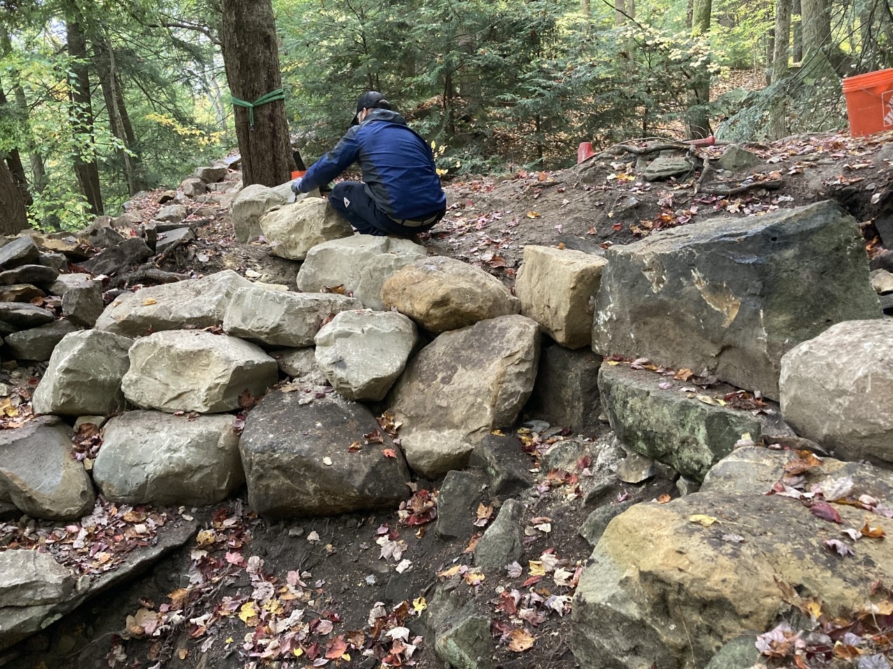 Online MNR alum Daniel Dydek is building a stone retaining wall. 