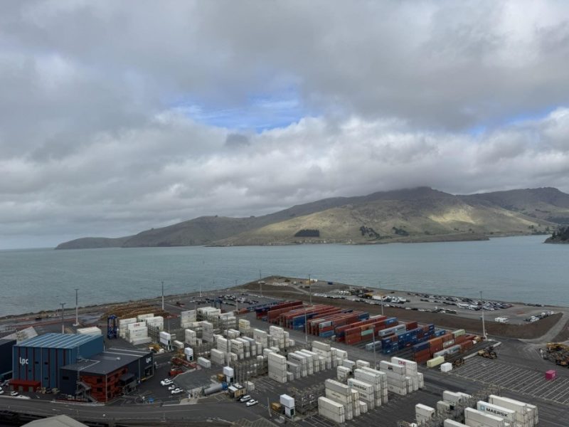 shipping container lot by body of water