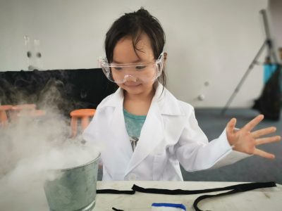 Young child playing scientist 