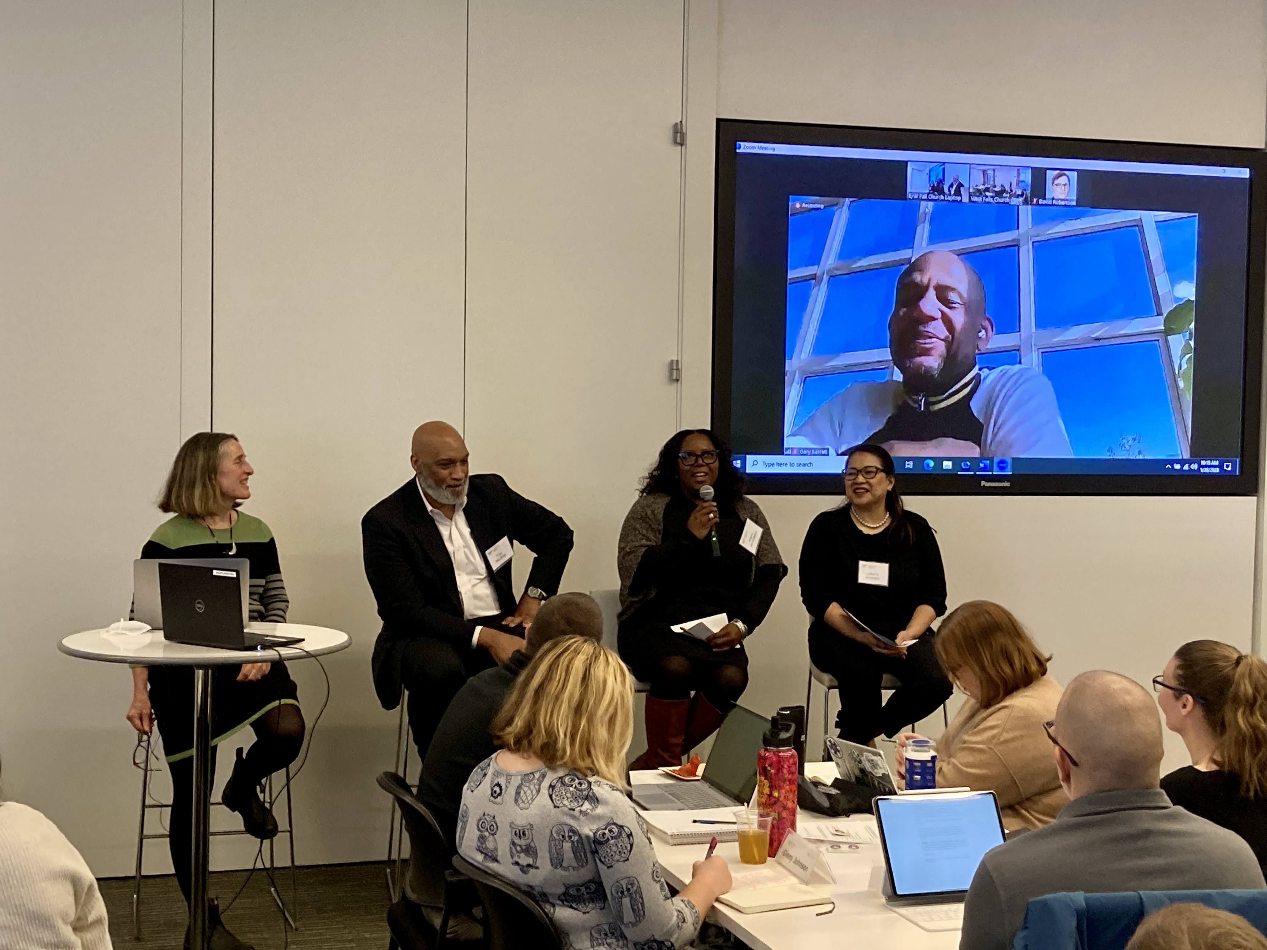 XMNR faculty Gary Barrett and Holly Wise co-host a panel of international development experts including Tim McRae, Aleta Williams, and Laura Alonzo. Photo: Amy Hubbard 